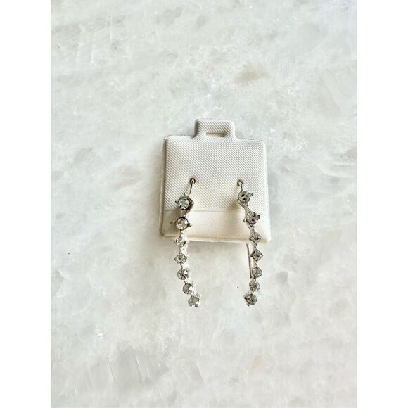 Cubic zirconia curve dangle earrings ￼ - Picture 1 of 2